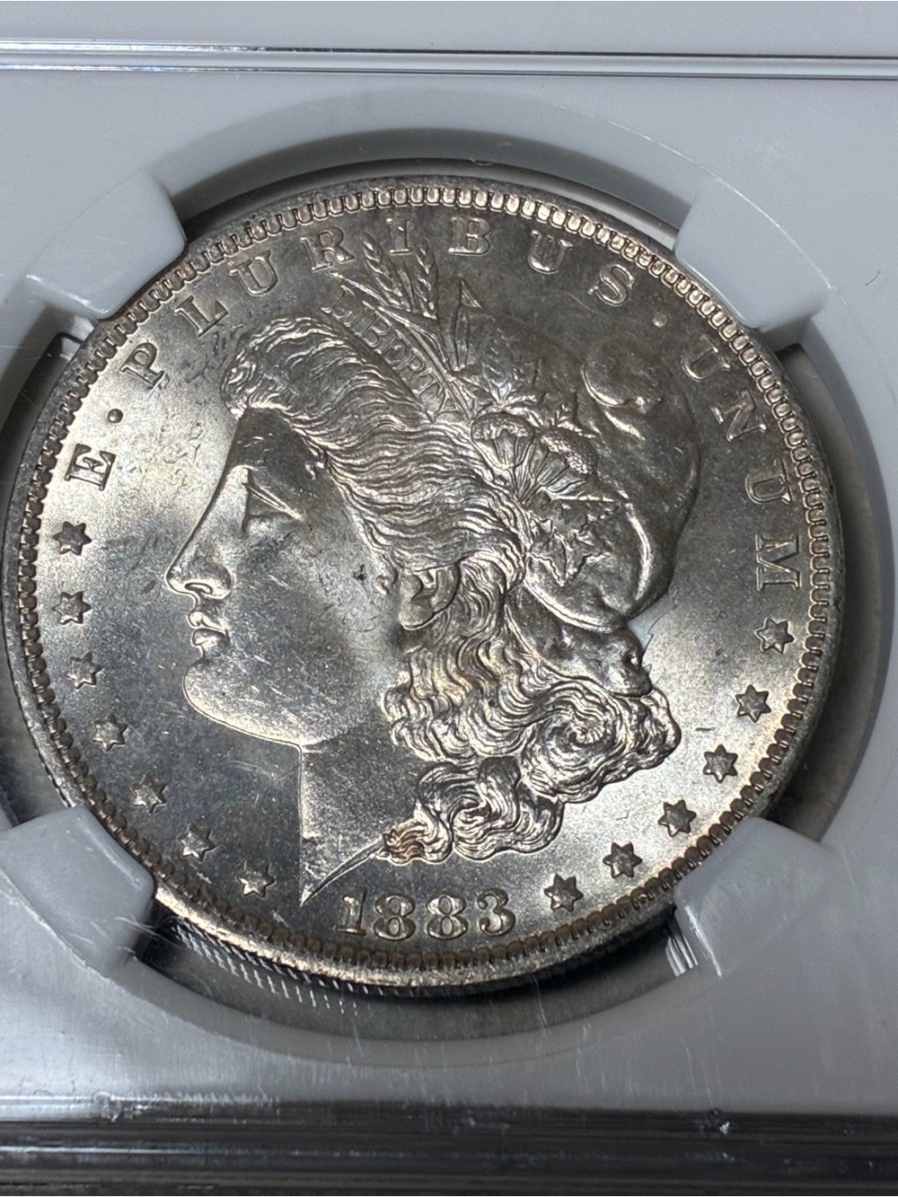 1883-O Morgan Silver Dollar NGC MS64 - Lustrous Silver Coin - Picture 2 of 4